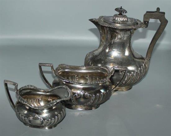 George IV demi fluted silver teapot and 3 piece plated tea set(-)